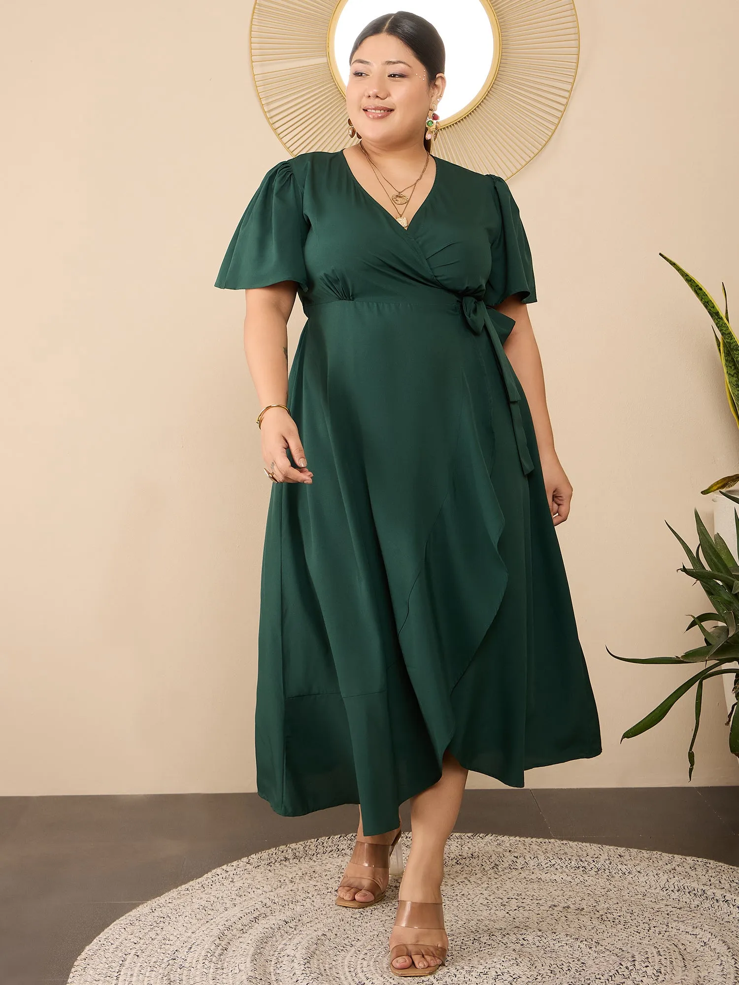 Berrylush Curve Women Solid Green V-Neck Flared Sleeves Tie-Up Waist Asymmetrical Hem Wrap Ruffled Maxi Dress