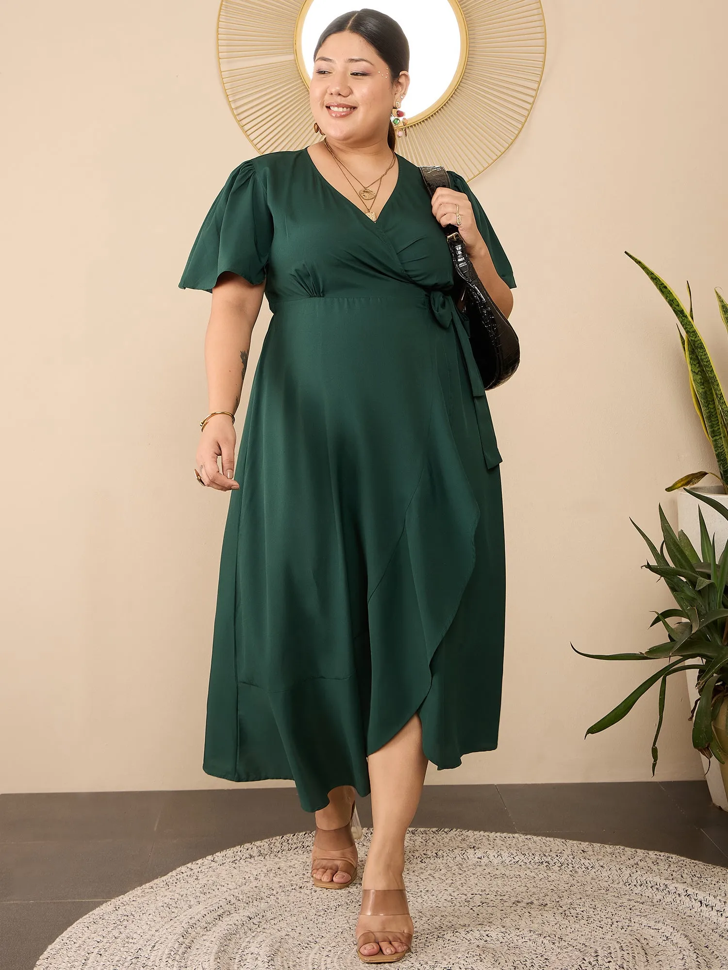 Berrylush Curve Women Solid Green V-Neck Flared Sleeves Tie-Up Waist Asymmetrical Hem Wrap Ruffled Maxi Dress