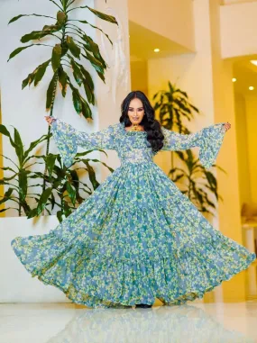 Elegant Light Blue Habesha Chiffon: with Yellow Adornments for Any Event Ethiopian Made Chiffon Dress